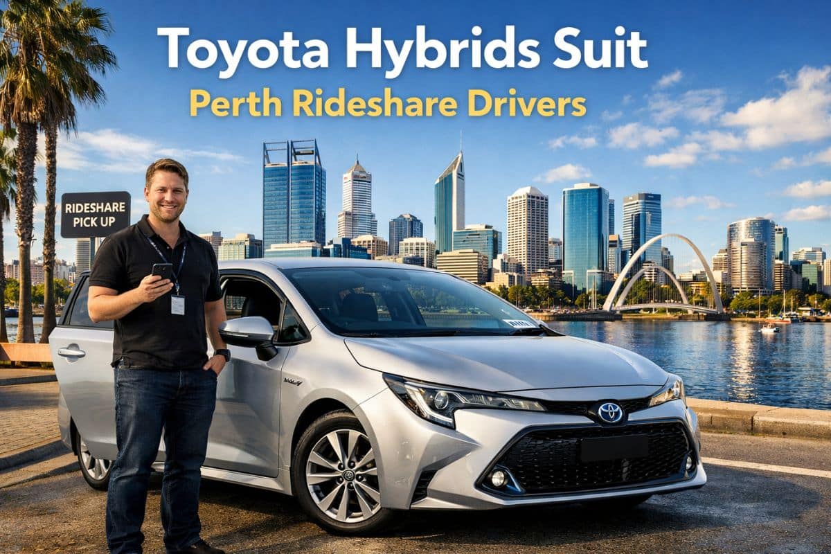 Toyota hybrid rideshare driver with car in Perth city skyline at rideshare pick-up location